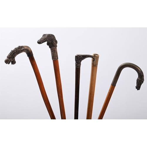 743 - A GROUP OF FIVE METAL HANDLED WALKING STICKSFour with animal handles including; a sterling silver cr... 