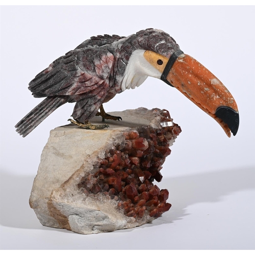 782 - A LARGE CARVED SEMI PRECIOUS STONE MODEL OF A TOUCANMODERNThe semi precious stones include dolomite,... 