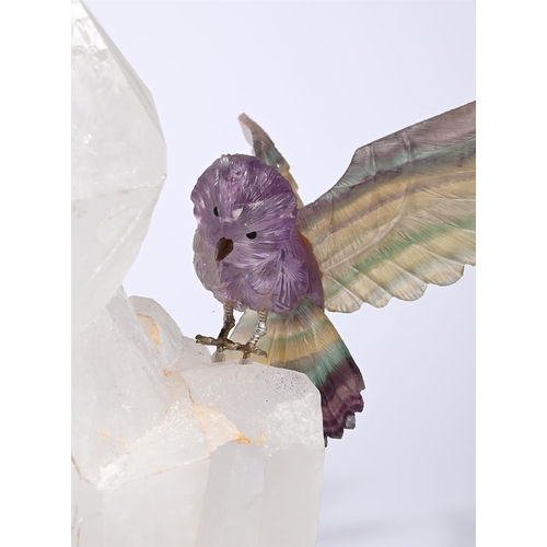 787 - A PAIR OF CARVED TOURMALINE MODELS OF PERCHING OWLSMODERNAtop a quartz crystal formation25.5cm high,... 