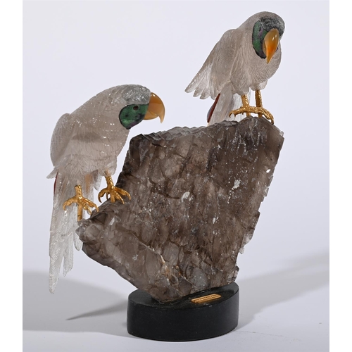 788 - A PAIR OF CARVED ROCK CRYSTAL MODELS OF PERCHING PARROTSMODERNAtop a smoked quartz formation base, t... 