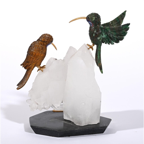 790 - A PAIR OF CARVED SEMI PRECIOUS STONE MODELS OF HUMMING BIRDSMODERNPerched atop a quartz and crystal ... 