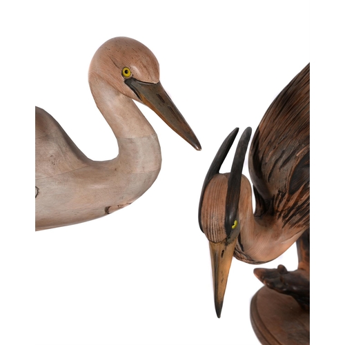 810 - TOM TABER & JOHN FAIRFIELD, A PAIR OF CARVED WOOD MODELS OF HERONS LATE 20TH CENTURYComprising a mal... 