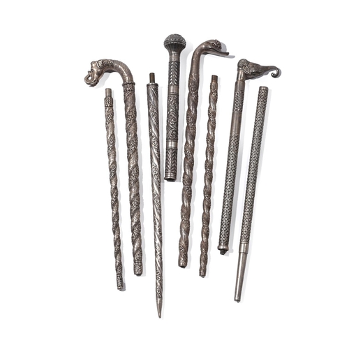 815 - A GROUP OF FOUR SILVER WALKING STICKSAll unscrew into two partsthe shortest approximately 88cm, the ... 