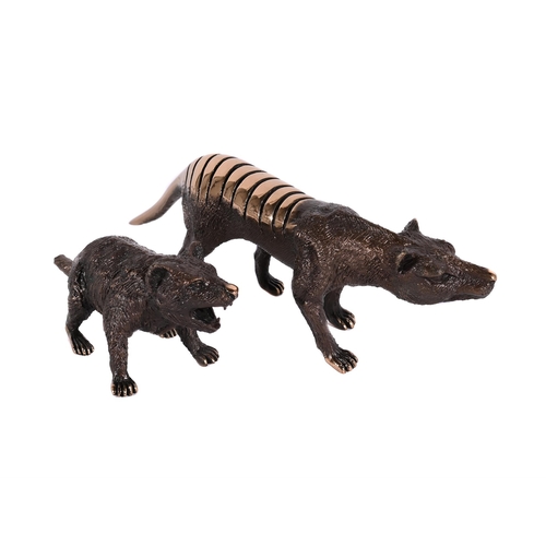 833 - A PAIR OF PATINATED BRONZE MODELS OF TASMANIAN MARSUPIALS EACH SIGNED WITH INITIALS 'EMB' TO ONE FOO... 