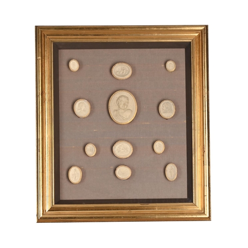 847 - A SET OF THREE FRAMED AND GLAZED GROUPS OF PLASTER IMPRONTE OR CAMEOS LATE 19TH CENTURY AND LATER Ea... 