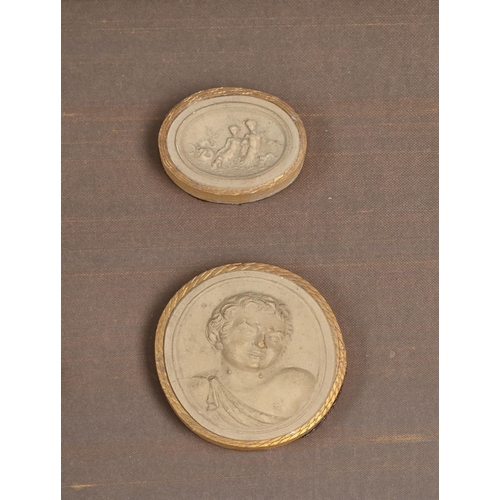 847 - A SET OF THREE FRAMED AND GLAZED GROUPS OF PLASTER IMPRONTE OR CAMEOS LATE 19TH CENTURY AND LATER Ea... 