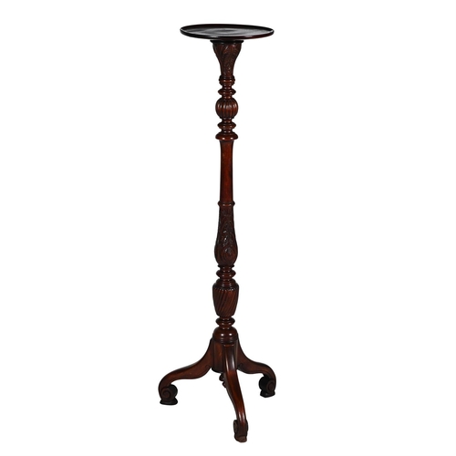 104 - A MAHOGANY TORCHERE STAND 19TH CENTURYWith carved, turned, and wrythen stem above tripod base137cm h... 