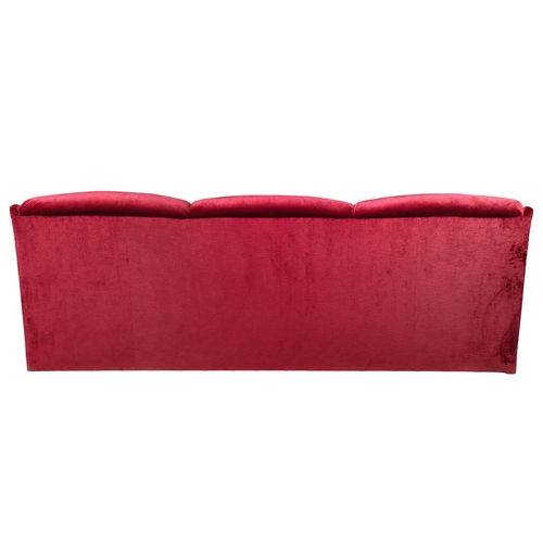 111 - A RED VELVET THREE SEAT SOFABY LUCY EADIE INTERIORS, OF RECENT MANUFACTURE88cm high, 244cm wide, 95c... 