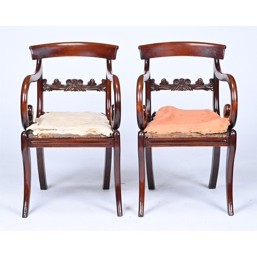 123 - A PAIR OF REGENCY MAHOGANY ARMCHAIRSCIRCA 1820Each with a bar back above carved horizontal splat, op... 