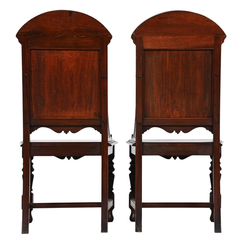 127 - A PAIR OF VICTORIAN CARVED MAHOGANY HALL CHAIRSLATE 19TH CENTURY111cm high, 54cm wide, 51cm deep