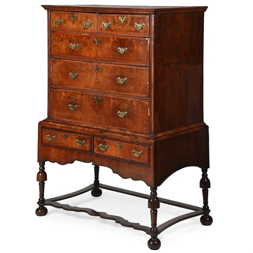 28 - A WALNUT CHEST ON STANDCIRCA 1740 AND LATER149cm high, 104cm wide, 58cm deep