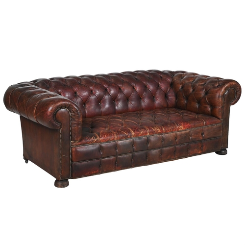 32 - A VICTORIAN BUTTON UPHOLSTERED SOFA, OF CHESTERFIELD TYPELATE 19TH OR EARLY 20TH CENTURY With horseh... 