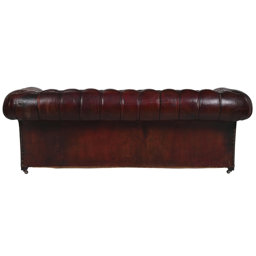 32 - A VICTORIAN BUTTON UPHOLSTERED SOFA, OF CHESTERFIELD TYPELATE 19TH OR EARLY 20TH CENTURY With horseh... 