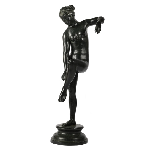 37 - AFTER THE ANTIQUE, APHRODITE UNTYING HER SANDALLATE 20TH CENTURYpatinated metal66cm high, 19cm diame... 