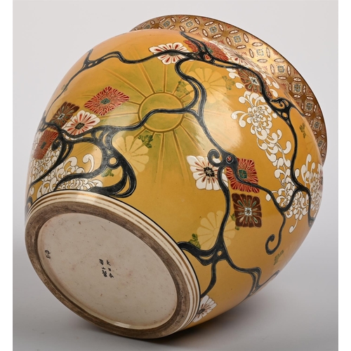 39 - A JAPANESE SATSUMA JARDINEREMEIJI PERIOD painted with flowers on an orange groundapproximately 29cm ... 