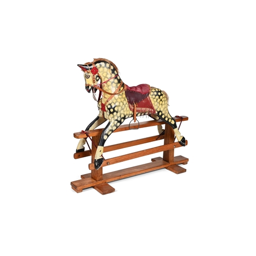 394 - A POLYCHROME PAINTED CARVED WOOD ROCKING HORSEBY COLLINSON, LIVERPOOL, FIRST HALF 20TH CENTURY128cm ... 