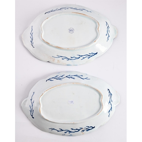 45 - A PAIR OF BOW PORCELAIN BLUE AND WHITE OVAL RELIEF-MOULDED SERVING DISHESCIRCA 1765Painted with frui... 