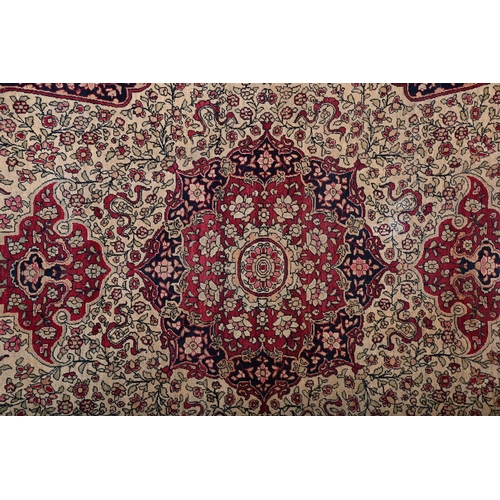 47 - AN ISFAHAN RUGapproximately 224 x 143cm