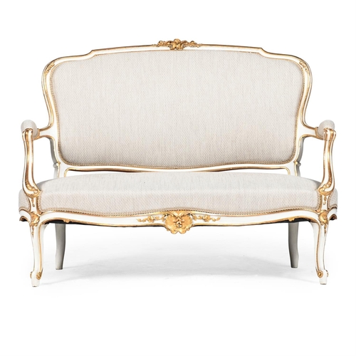 54 - A FRENCH GILTWOOD AND PAINTED CANAPE SOFA IN LOUIS XVI STYLE 19TH CENTURYWith recent cream cotton up... 