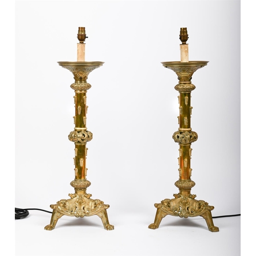 6 - A PAIR OF POLISHED BRASS LAMPSIN CELTIC REVIVAL STYLE, 20TH CENTURY90cm high (including shades), the... 