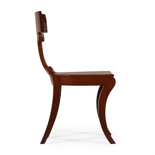 64 - A REGENCY MAHOGANY HALL CHAIR IN THE MANNER OF THOMAS HOPE, CIRCA 1820The bar back above scrolled sh... 