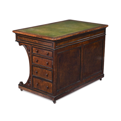 67 - AN AESTHETIC MOVEMENT WALNUT AND EBONSIED WRITING DESK CIRCA 1890With a green leather inset above an... 