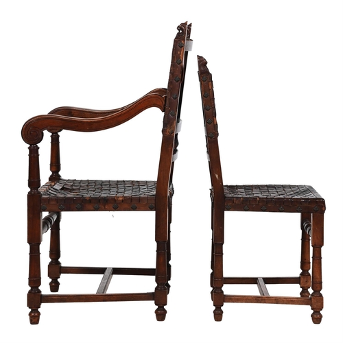 89 - A SET OF TEN VICTORIAN CARVED WALNUT AND LEATHER UPHOLSTERED DINING CHAIRSLATE 19TH CENTURYEach with... 