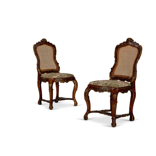 57 - A PAIR OF PARCEL GILT AND OAK SIDE CHAIRS LATE 19TH/EARLY 20TH CENTURY, IN THE LOUIS XV STYLE Each w... 