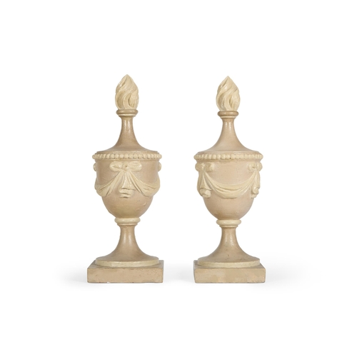 55 - A PAIR OF GREY AND CREAM PAINTED CARVED WOOD FLAMING URNSNORTH EUROPEAN, LATE 18TH/EARLY 19TH CENTUR... 