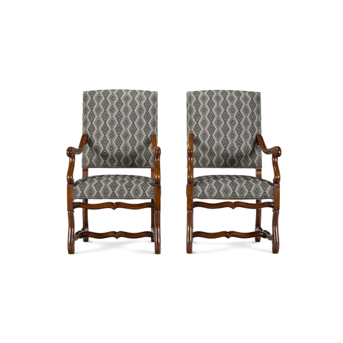 65 - A PAIR OF CHESTNUT OPEN ARMCHAIRSFRENCH, 19TH CENTURY, IN THE 17TH CENTURY STYLE Upholstered in a bl... 