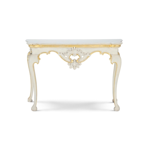 77 - A CREAM AND PARCEL GILT SERPENTINE SIDE TABLEEARLY 20TH CENTURY, IN THE LOUIS XV STYLERedecorated 81... 