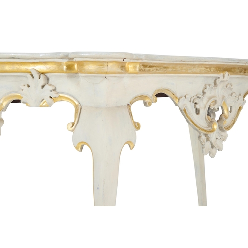 77 - A CREAM AND PARCEL GILT SERPENTINE SIDE TABLEEARLY 20TH CENTURY, IN THE LOUIS XV STYLERedecorated 81... 