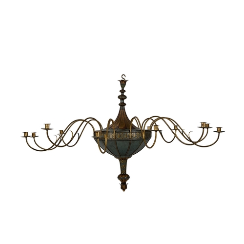 98 - A GILT DECORATED TOLE TWELVE BRANCH CHANDELIERPOSSIBLY FRENCH, 19TH CENTURY AND LATERapproximately 7... 