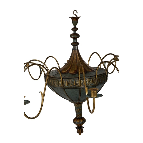 98 - A GILT DECORATED TOLE TWELVE BRANCH CHANDELIERPOSSIBLY FRENCH, 19TH CENTURY AND LATERapproximately 7... 