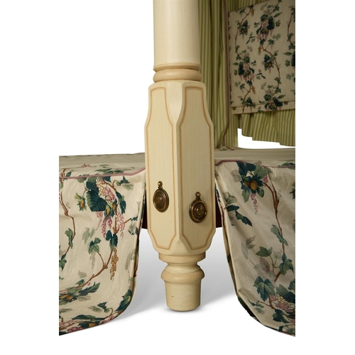 99 - A CREAM PAINTED, SIMULATED BAMBOO FOUR POSTER BEDBY SIBYL COLEFAX & JOHN FOWLERDressed with green 'L... 