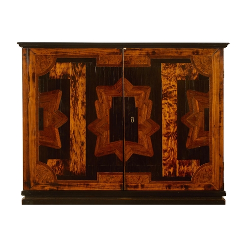 100 - Y AN EBONY, SPECIMEN WOOD AND EBONISED COIN/MEDAL CABINET ON STANDEARLY 19TH CENTURY AND LATEROn an ... 