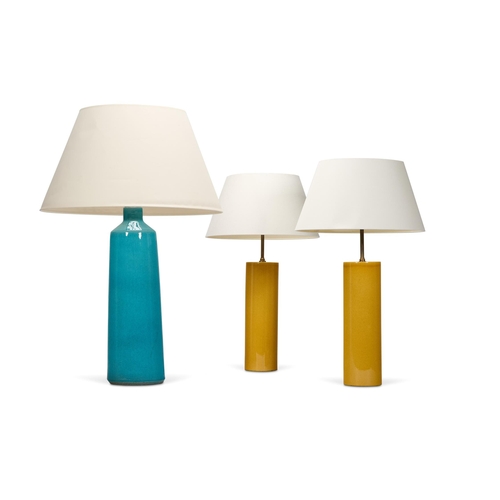 101 - A PAIR OF YELLOW GLAZED CYLINDRICAL POTTERY LAMPS MODERN74cm high overallTogether with a turquoise g... 