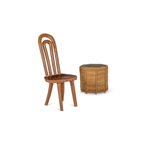 102 - A RUSTIC LOW SIDE CHAIR WITH A DOUBLE HOOP BACK AND WOODEN SEATMADAGASCAR, 20TH CENTURY96.5cm high, ... 