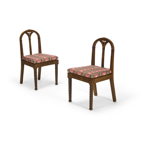 11 - A PAIR OF GRAINED OAK GOTHIC SIDE CHAIRS ENGLISH, MID 19TH CENTURY  Each with a Sibyl Colefax & John... 