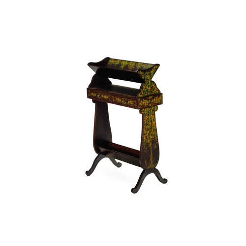 122 - A FLORAL PAINTED, PARCEL GILT AND EBONISED BOOK STANDEARLY 20TH CENTURY84cm high, 55cm wide, 21cm de... 