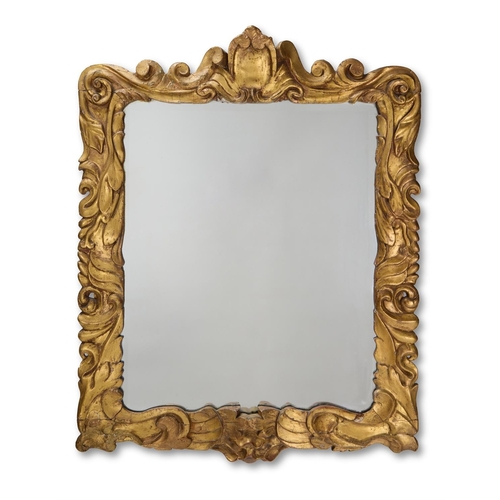 125 - A CARVED AND GILDED AURICULAR SUNDERLAND PICTURE FRAME MIRRORENGLISH, 17TH CENTURYWith a later bevel... 