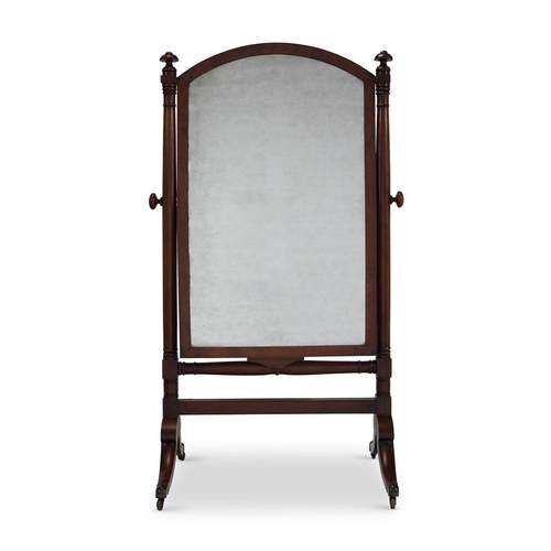 128 - A MAHOGANY CHEVAL MIRROR ENGLISH, EARLY 19TH CENTURYWith an associated arched plate175cm high, 101cm... 