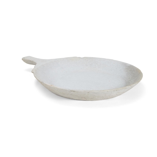 141 - A STONE DISH OF LARGE SIZEINDIAN, 20TH CENTURYWith extending handle80cm long including handle, 62.5c... 