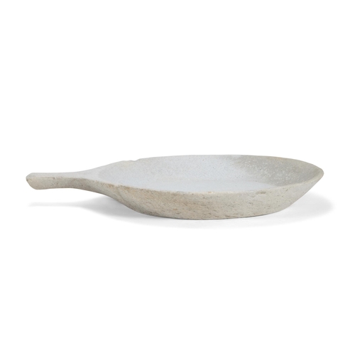 141 - A STONE DISH OF LARGE SIZEINDIAN, 20TH CENTURYWith extending handle80cm long including handle, 62.5c... 