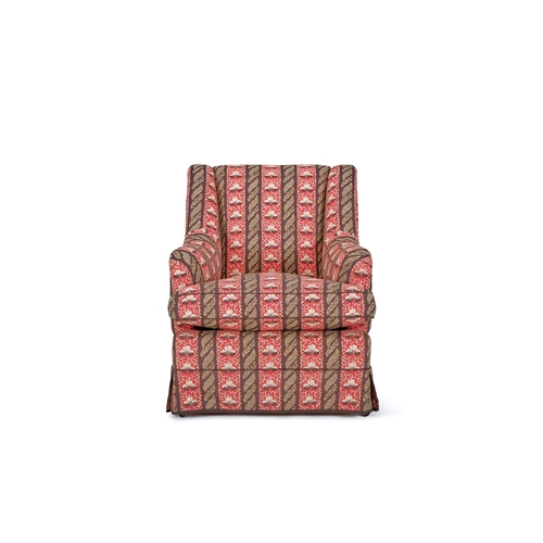 154 - A 'ST JAMES' EASY ARMCHAIRBY SIBYL COLEFAX & JOHN FOWLER Upholstered in Sibyl Colefax & John Fowler ... 