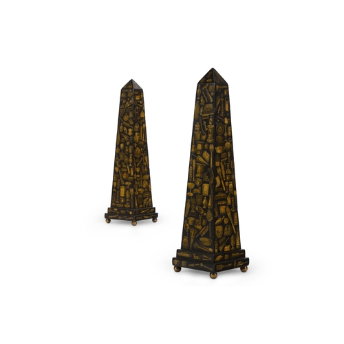 156 - A PAIR OF BLACK PAINTED AND GILT DECOUPAGE DECORATED WOODEN OBELISKSMODERN49.5cm high, 13cm square