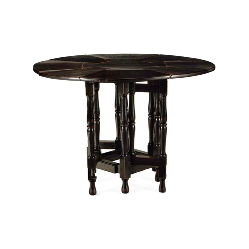 157 - AN ARTS AND CRAFTS EBONISED OAK DROP-LEAF GATELEG TABLE EARLY 20TH CENTURY The circular top comprisi... 