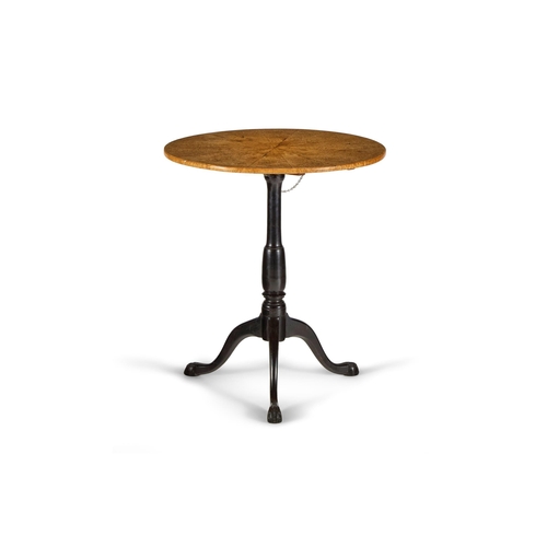 180 - A BIRCHWOOD AND EBONISED TRIPOD TABLESWEDISH, FIRST HALF 19TH CENTURYThe circular tilt top radially ... 