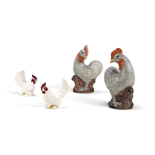 183 - A PAIR OF PAINTED POTTERY MODELS OF CHICKENSLATE 20TH CENTURY45cm highTogether with a smaller pair o... 