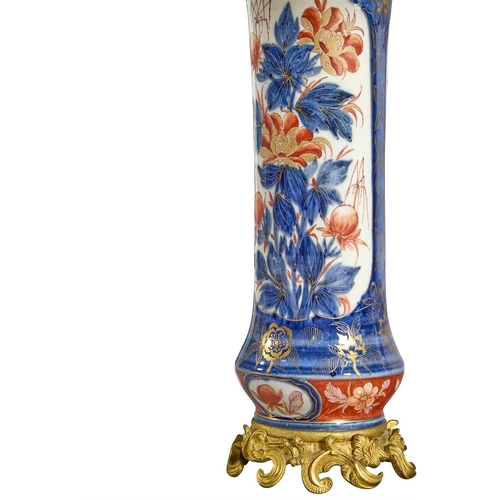 185 - A PAIR OF IMARI PORCELAIN GU SHAPED VASES OF LARGE SIZEJAPANESE, 19TH CENTURYLater ormolu mounted an... 